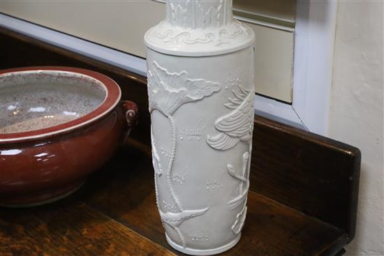 A Chinese white glazed moulded rouleau vase, Wang Bingrong seal mark, H.34.5cm